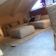 arredamento mansarda angolo relax con divano angolare